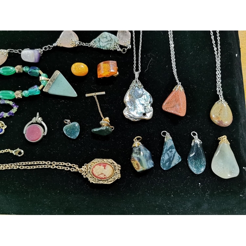 144 - Suite Of Gemstone Jewellery Including Pendants Bracelets Necklaces Etc Stand Not Included