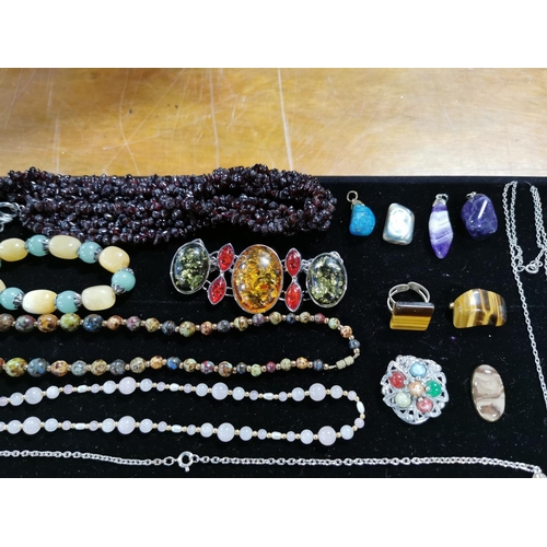 144 - Suite Of Gemstone Jewellery Including Pendants Bracelets Necklaces Etc Stand Not Included