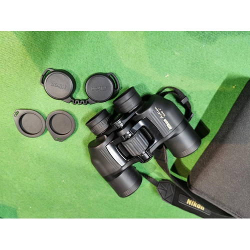 36 - A Pair Nikon Action Binoculars 10x40 In Good Clean Condition With Case