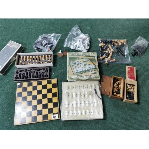 84 - Large Quantity Of Chess Pieces Inc Complete Glass Chess Set And A Chess Board