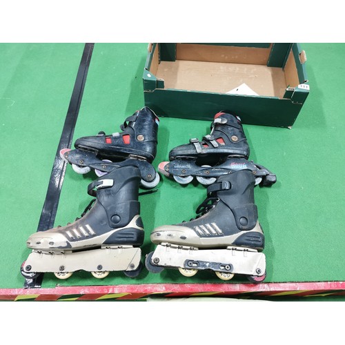 111 - Two Pairs Of Adults Roller Blades One Size 11 Other Smaller Size Unkown