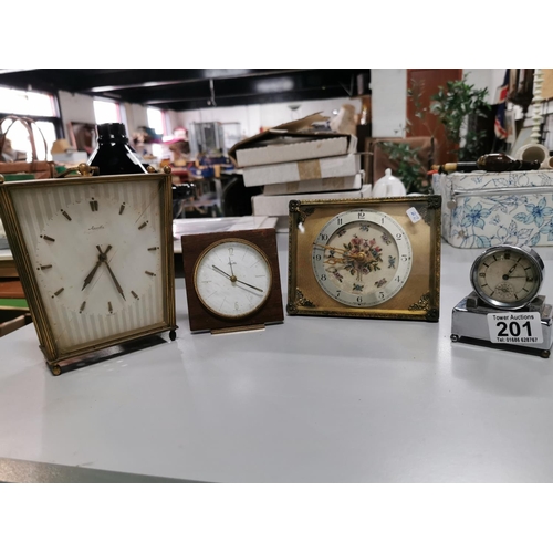 201 - Four collectable clocks inc two Mauthe clocks a good art deco chrome alarm clock and one other