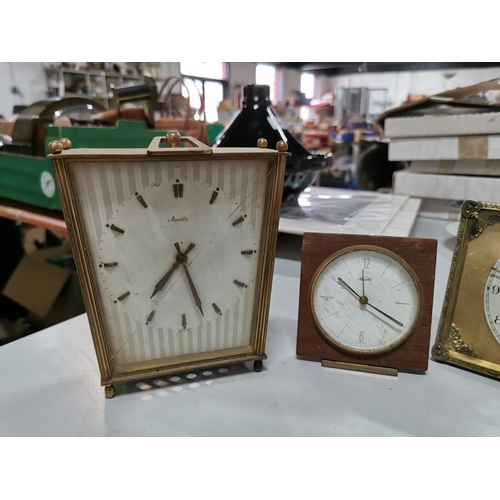 201 - Four collectable clocks inc two Mauthe clocks a good art deco chrome alarm clock and one other