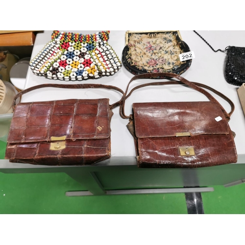 202 - Collection of collectable bags inc colourful beaded 70's one two vintage crocodile leather ones a bl... 