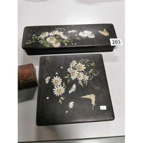 203 - Two vintage hand painted black lacquered oriental boxes and one other