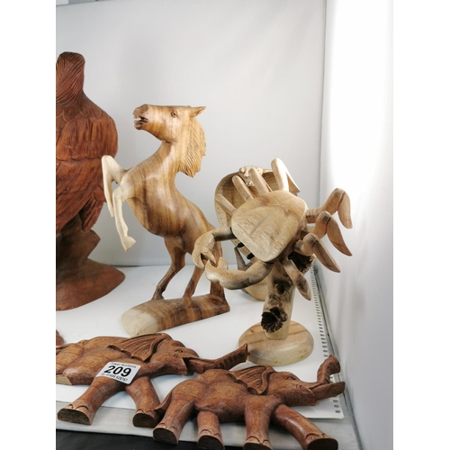 209 - Quantity of five hand carved figures inc a good tall solid wood carved Eagle figure (41cm) and good ... 