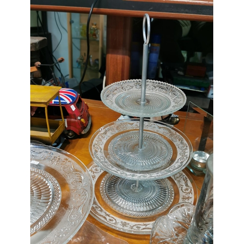 213 - Quantity of glass cake stands and candle holders