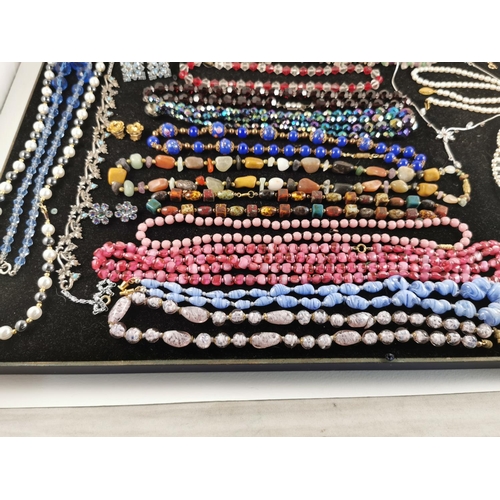 216 - Suit of good costume jewellery inc gemstone beaded necklaces, glass beaded necklaces, earrings, pend... 