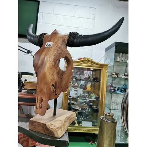 226 - Wooden sculpture of a bulls head 55cm by 55cm