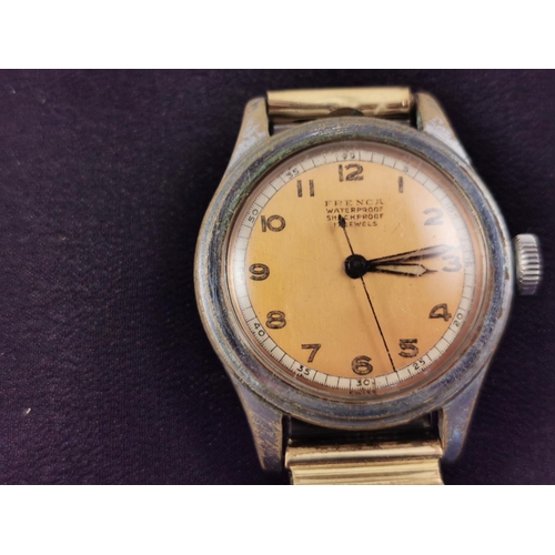 283 - Collectable vintage Frenca two tone 17 jewel watch with a rolled gold strap