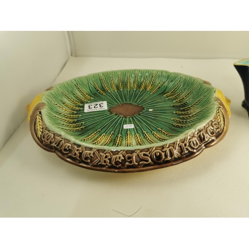 323 - Antique 19C Majolica wheat bread tray appetite obeys where reason rules, along with an antique Majol... 