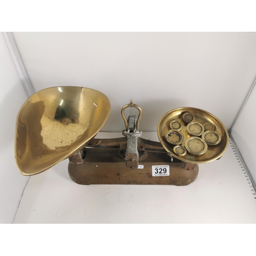 329 - Pair of Avery scales with brass trays and brass weights