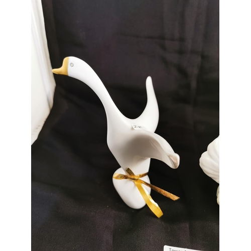 358 - Spanish Lladro type dove figure and a Hollohaza Hungary swam figure