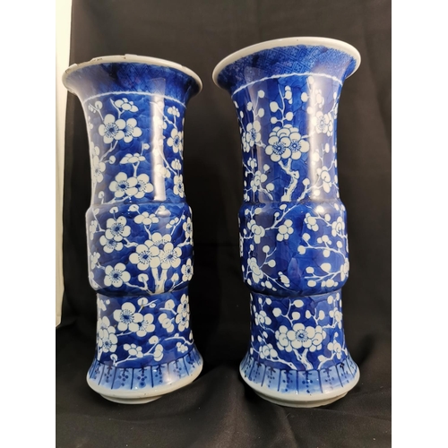 370 - A pair of Antique Chinese Blue & White apple blossom vases with Kangxi reign mark to base 
25.5 cm t... 