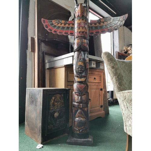 417 - Tall carved totem pole damage to the base 152cm tall by 102cm wide