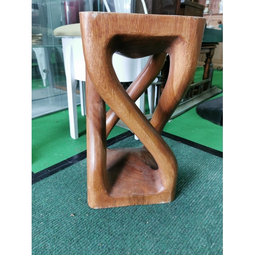 419 - Unusual stool carved out of one piece of wood 51cm high 28cm wide