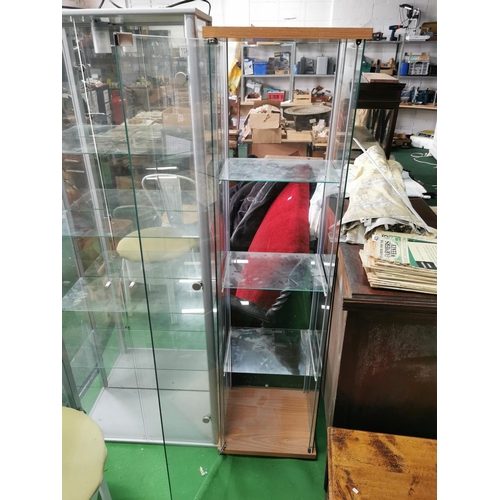 427 - Glass display case with door to front and three glass shelves Height of 164cm by 42.5cm squared