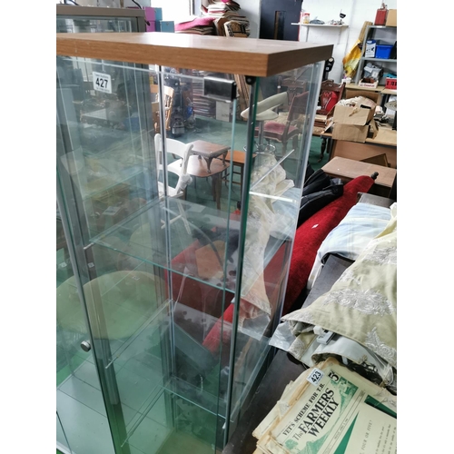 427 - Glass display case with door to front and three glass shelves Height of 164cm by 42.5cm squared