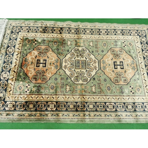 439 - Vintage middle eastern type rug, professionally cleaned  length of 116cm by 69cm