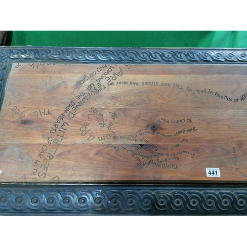 441 - Vintage ornate wrought iron based table with solid oak inset carved with poems on trees 121cm long, ... 