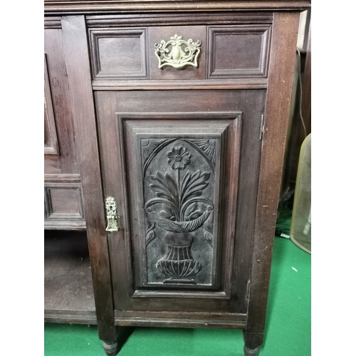 442 - Ornate Victorian solid mahogany side board with two good carved doors and brass fittings, drawers an... 