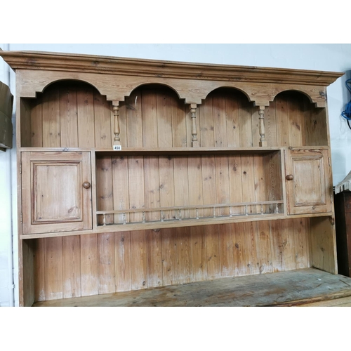 450 - Good antique pitch pine dresser with four drawers and four doors below, with nice galleried shelf wi... 