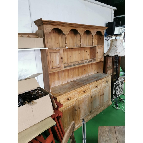 450 - Good antique pitch pine dresser with four drawers and four doors below, with nice galleried shelf wi... 