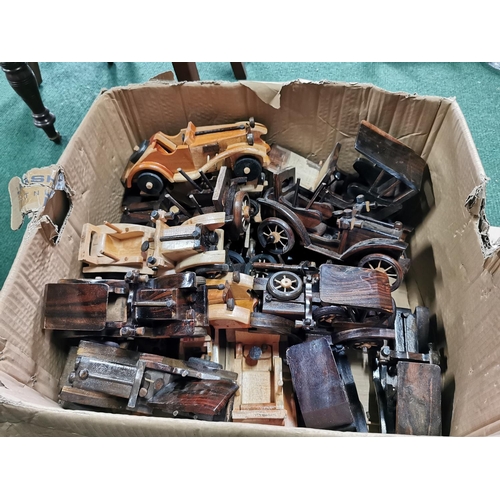 468 - Very large quantity various wooden model cars and motorcycles along with a box of parts most have bi... 