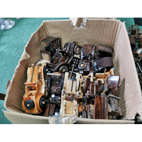 468 - Very large quantity various wooden model cars and motorcycles along with a box of parts most have bi... 