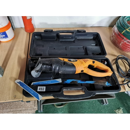 492 - Cased JCB reciprocating electric saw with good spare blades