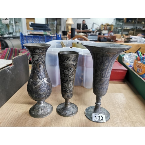 133 - Five metal middles eastern vases inc a solid copper one and two beakers