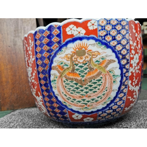 157 - Antique large hand painted Japanese scallop rimmed Imari fish bowl with a dragon to the center insid... 