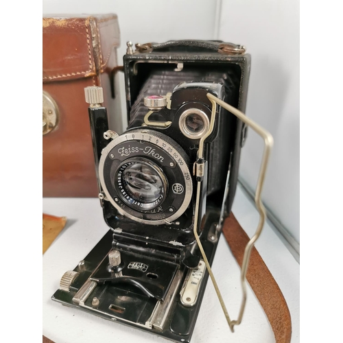 101 - Vintage Zeiss Ikon Compur plate camera with its original case and extra plates along with a Zeiss Ik... 