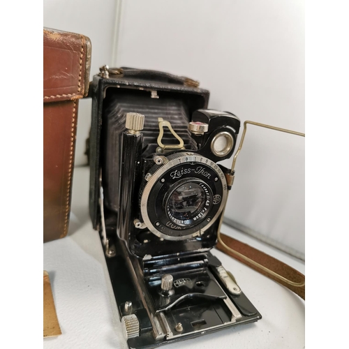 101 - Vintage Zeiss Ikon Compur plate camera with its original case and extra plates along with a Zeiss Ik... 