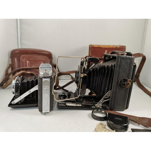 101 - Vintage Zeiss Ikon Compur plate camera with its original case and extra plates along with a Zeiss Ik... 