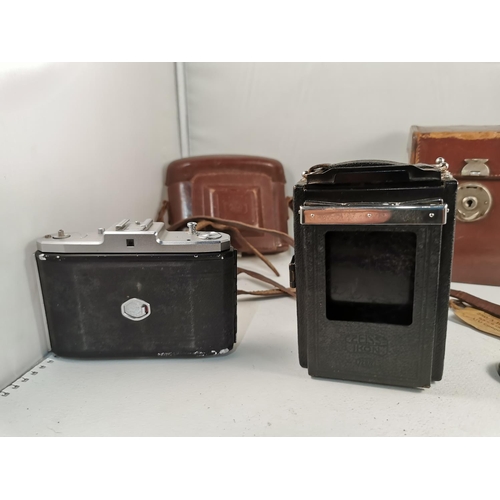 101 - Vintage Zeiss Ikon Compur plate camera with its original case and extra plates along with a Zeiss Ik... 