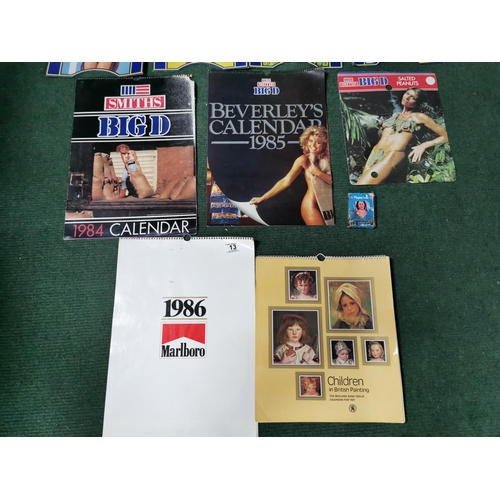 13 - Quantity of 1980's smiths big D calendars and advertising along with a pack of new playing cards Mar... 