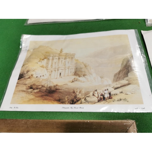 132 - Four lithographs by David Roberts, famous ship pictures and a quantity of frames