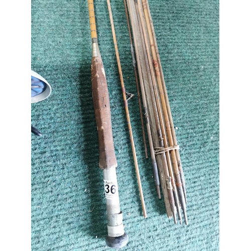 136 - Quantity of vintage split cane fishing rod sections and a Paul fencing sword