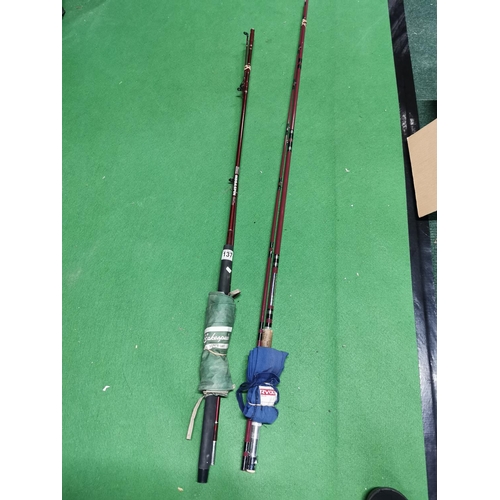 137 - Two fishing rods inc a Ryobi model 3409 and a Shakespear Megaspin rod