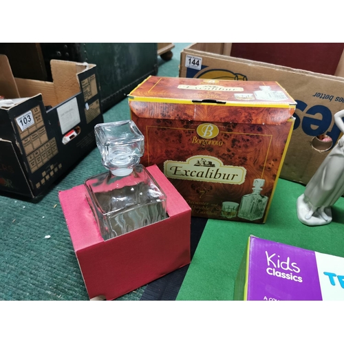 144 - Two boxes of odds inc a complete boxed decanter set, a pair of chrome art deco glasses, napkin rings... 