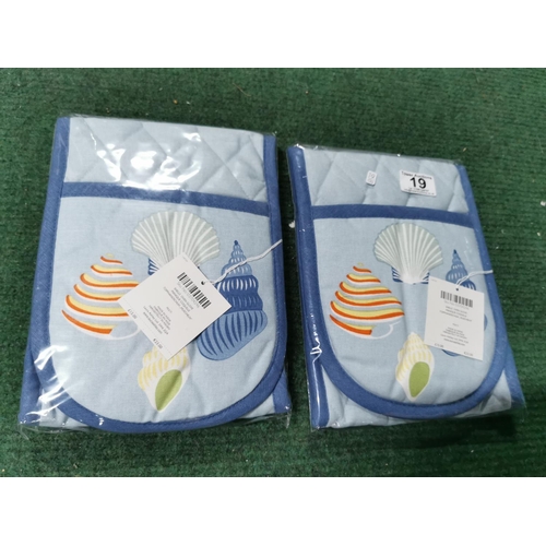 19 - Two new and sealed pairs of Laura Ashely oven gloves costing £15 each new