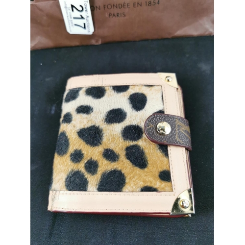 217 - Louis Vuitton purse with a Louis Vuitton shopping bag