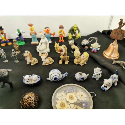 221 - Large quantity of miniature figures inc wade whimsy's, blue and white figures, cartoon characters et... 