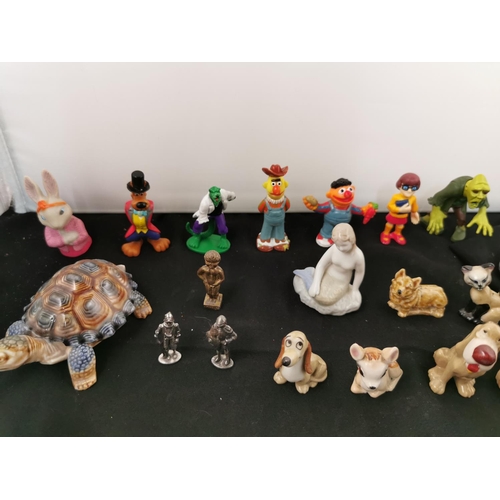 221 - Large quantity of miniature figures inc wade whimsy's, blue and white figures, cartoon characters et... 