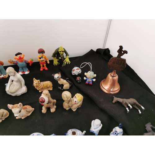 221 - Large quantity of miniature figures inc wade whimsy's, blue and white figures, cartoon characters et... 