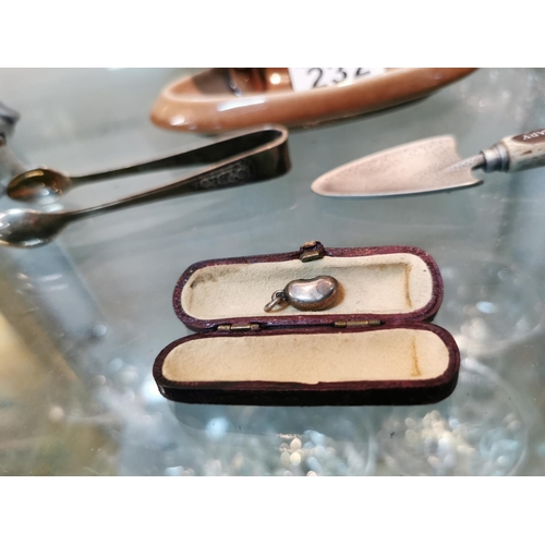 232 - Quantity of collectables inc wade whimsy's a porcelain finger head, a tested as silver coffee bean p... 