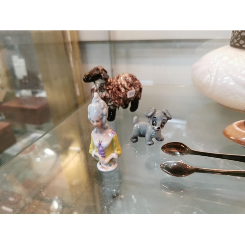 232 - Quantity of collectables inc wade whimsy's a porcelain finger head, a tested as silver coffee bean p... 