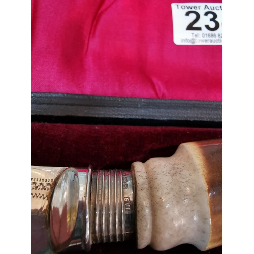 234 - Nice quality serving set with horn handles and hallmarked silver collars in a fitted plush case