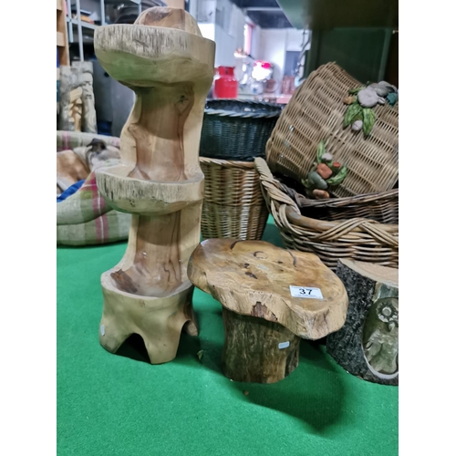 37 - Four carved owl logs a rustic carved stool and a bird drinking station